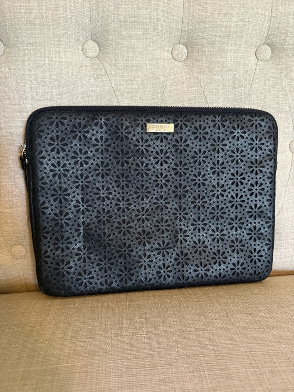kate spade Black Laser-Cut Floral Tech Sleeve with Gold Plaque